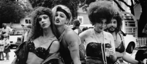 Four men dressed in drag participating in the Provincetown Carnival parade